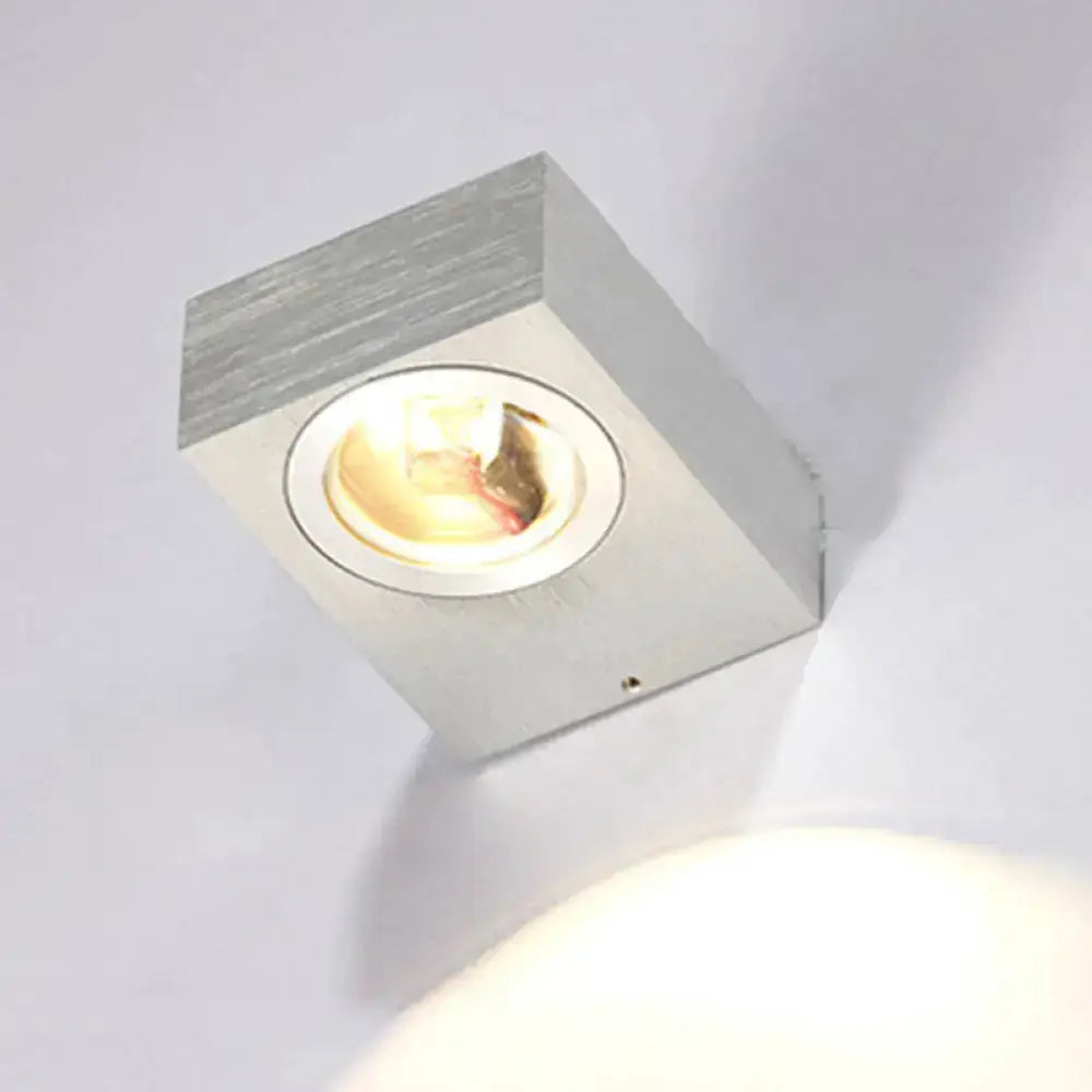 Brushed silver square LED wall light with round recessed lens on Tampa Home & Garden Store