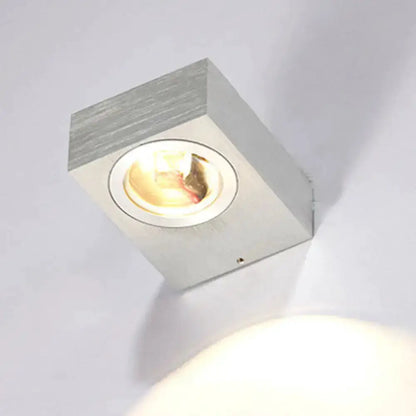Brushed silver square LED wall light with round recessed lens on Tampa Home & Garden Store