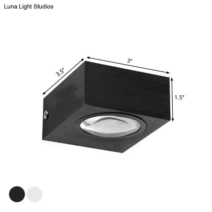RGB wall light in black with brushed silver finish; block with circular LED lens for corridors on Tampa Home & Garden Store