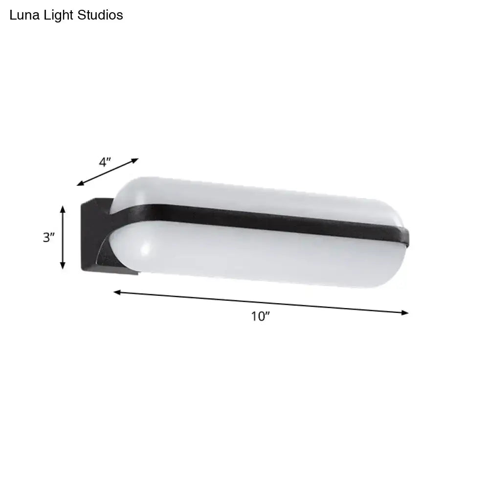 Black capsule flush mount wall sconce with glass cylinders and black metal base Decorbites on Tampa Home & Garden Store