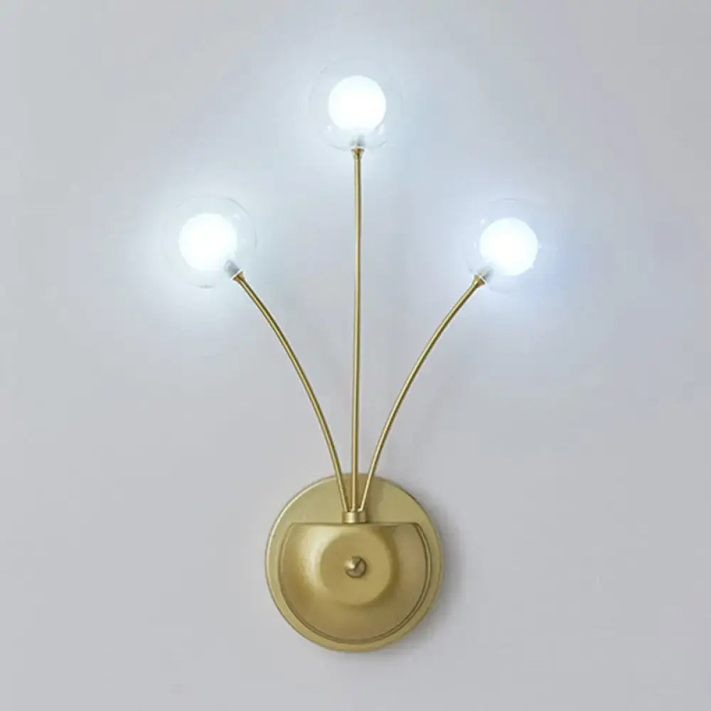 Black Iron Globe Sconce brass-finish wall light with three globe bulbs on Tampa Home & Garden Store