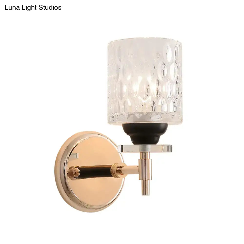 Black chrome dimpled sconce with textured glass shade by Decorbites on Tampa Home & Garden Store