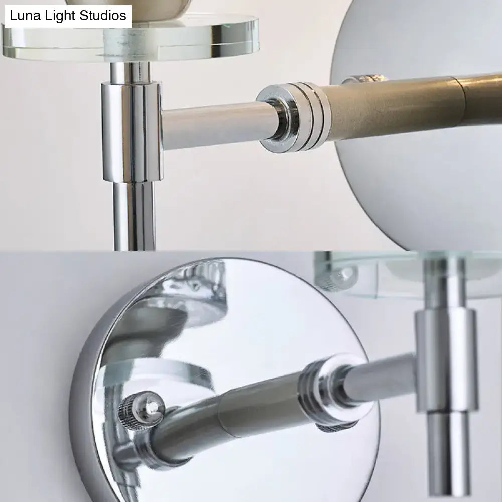 Black chrome dimpled sconce with textured glass shade and adjustable chrome arm on Tampa Home & Garden Store
