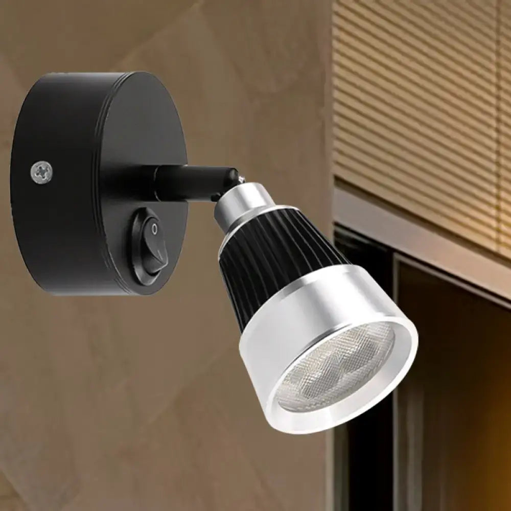 Black chrome rotatable wall sconce with silver metal shade and ribbed body on Tampa Home & Garden Store