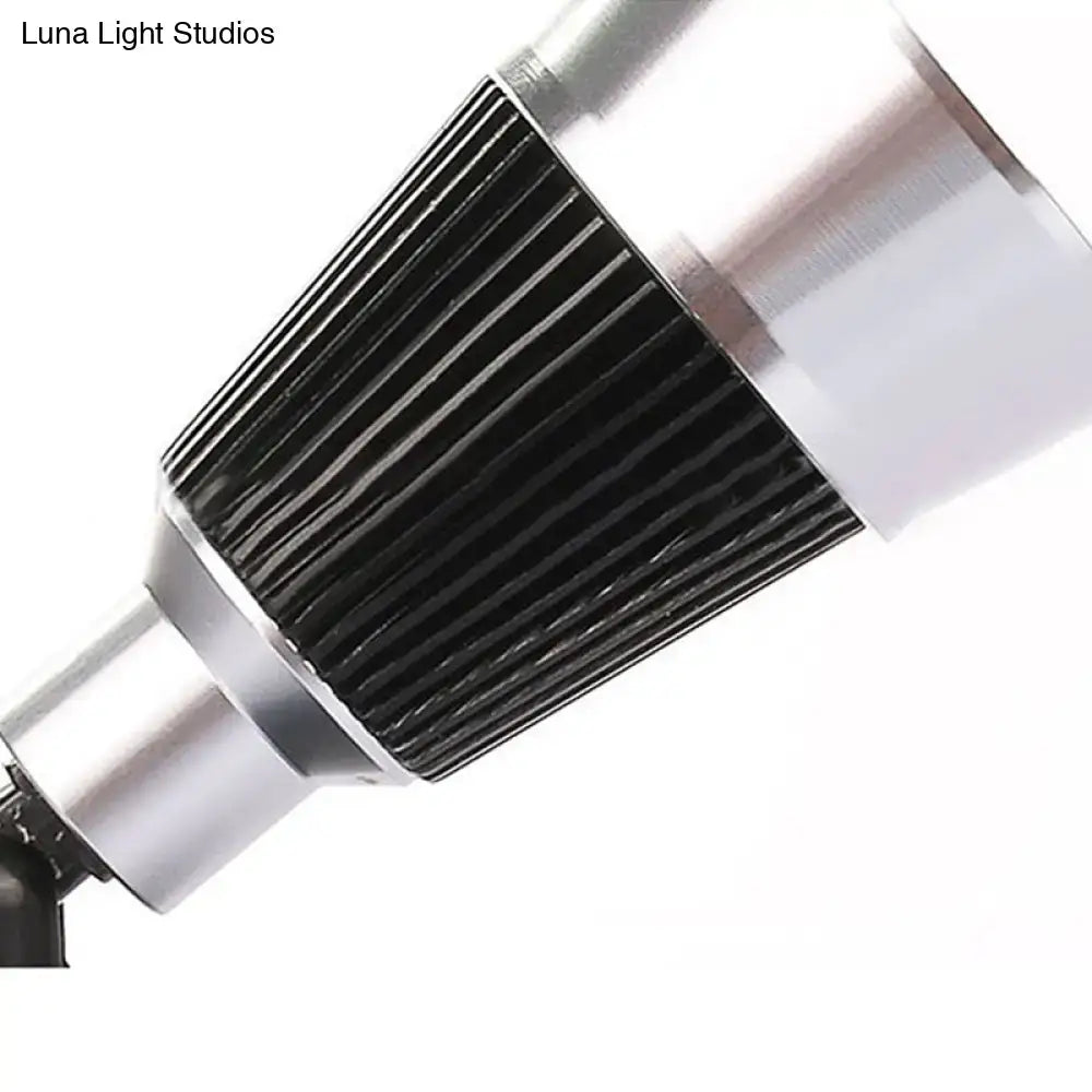 Black chrome rotatable sconce by Decorbites, ribbed metal cylinder with chrome ends on Tampa Home & Garden Store