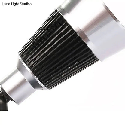 Black chrome rotatable sconce by Decorbites, ribbed metal cylinder with chrome ends on Tampa Home & Garden Store