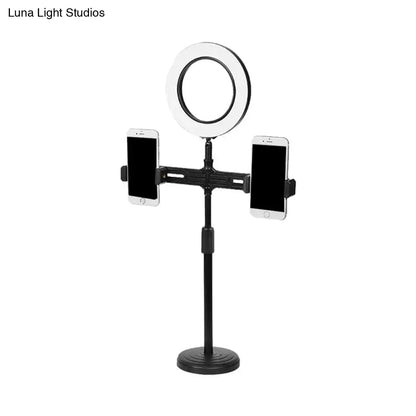 Black USB wall light with ring light and dual phone clamps on an adjustable tall stand on Tampa Home & Garden Store