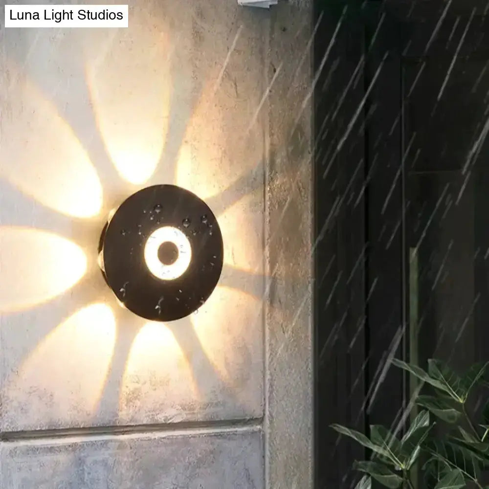 Modern black circular LED outdoor wall sconce garden light by Decorbites on Tampa Home & Garden Store