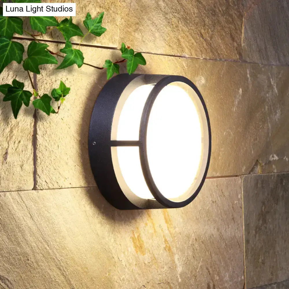 Decorbites modern black circular LED wall lamp outdoor warm lighting on Tampa Home & Garden Store