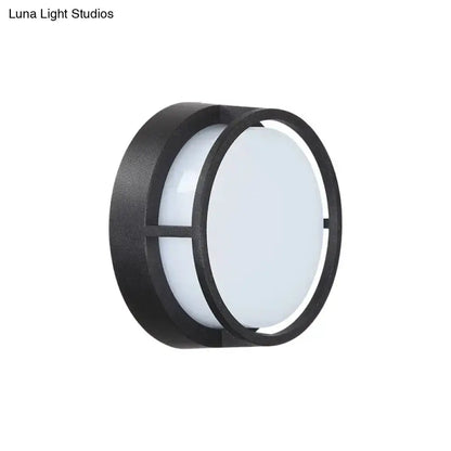Decorbites modern circular LED wall lamp with black metal frame and white diffuser outdoor on Tampa Home & Garden Store