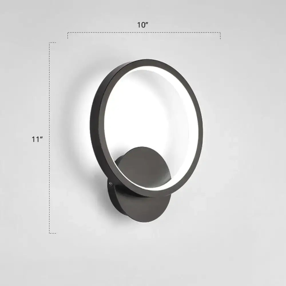 Black circular LED wall sconce with glowing ring, wall-mounted by Decorbites on Tampa Home & Garden Store