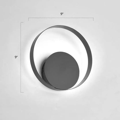 Black circular LED wall sconce with ring frame and centered disc 9in diameter on Tampa Home & Garden Store