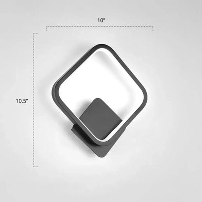 Black Circular LED Wall Sconce by Decorbites with white diffuser and black rounded frame on Tampa Home & Garden Store