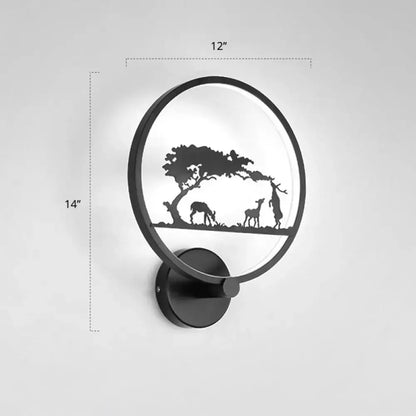 Black circular LED wall sconce by Decorbites with tree and grazing silhouettes on Tampa Home & Garden Store