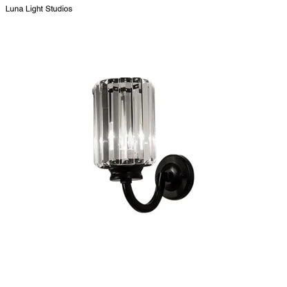 Black crystal drum sconce with curved metal arm by Decorbites, wall mount on Tampa Home & Garden Store