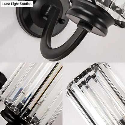 Black crystal drum sconce with black metal arm support by Decorbites on Tampa Home & Garden Store