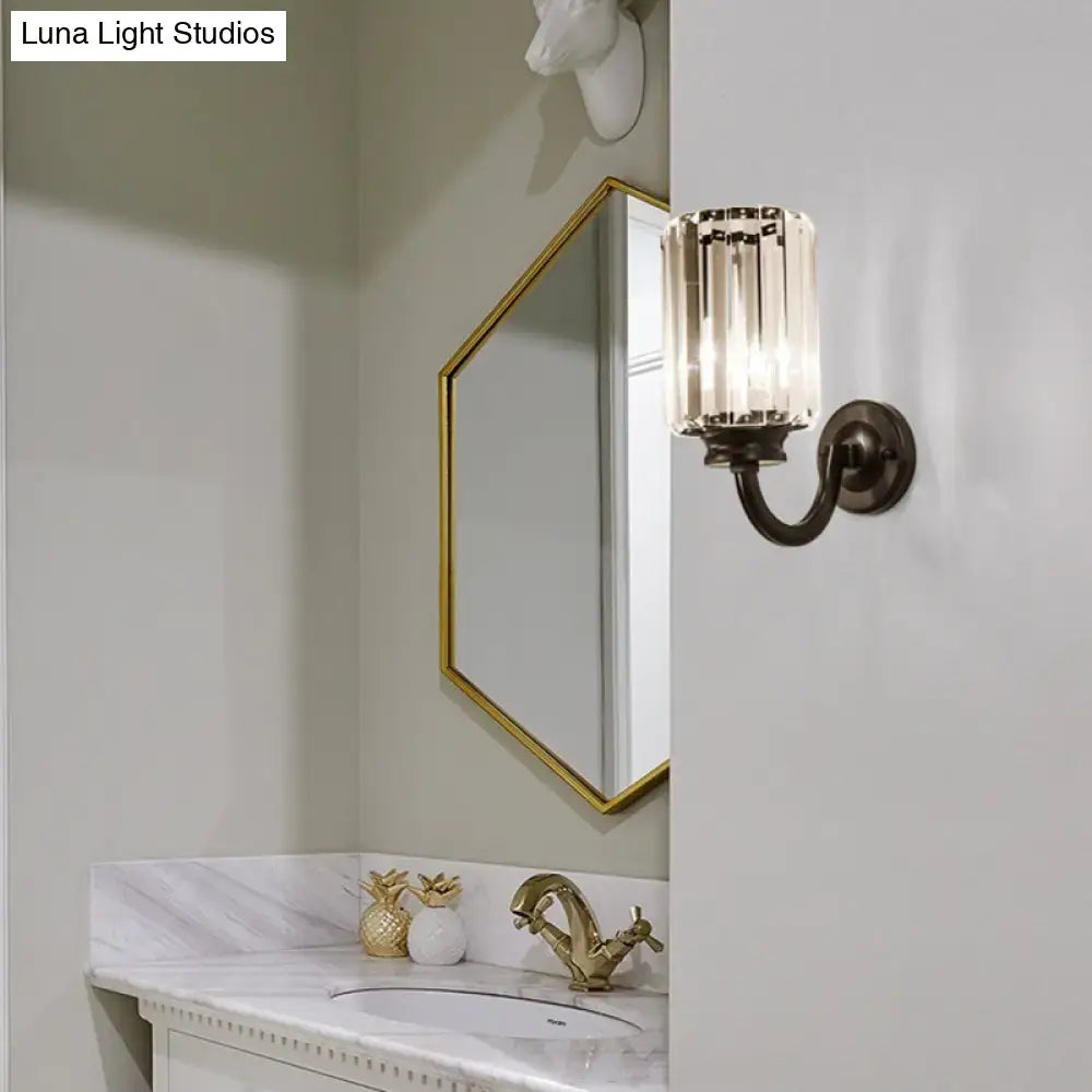 Black crystal drum sconce with curved bronze arm, Decorbites wall-mounted bathroom light on Tampa Home & Garden Store
