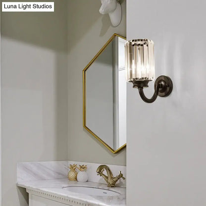 Black crystal drum sconce with curved bronze arm, Decorbites wall-mounted bathroom light on Tampa Home & Garden Store