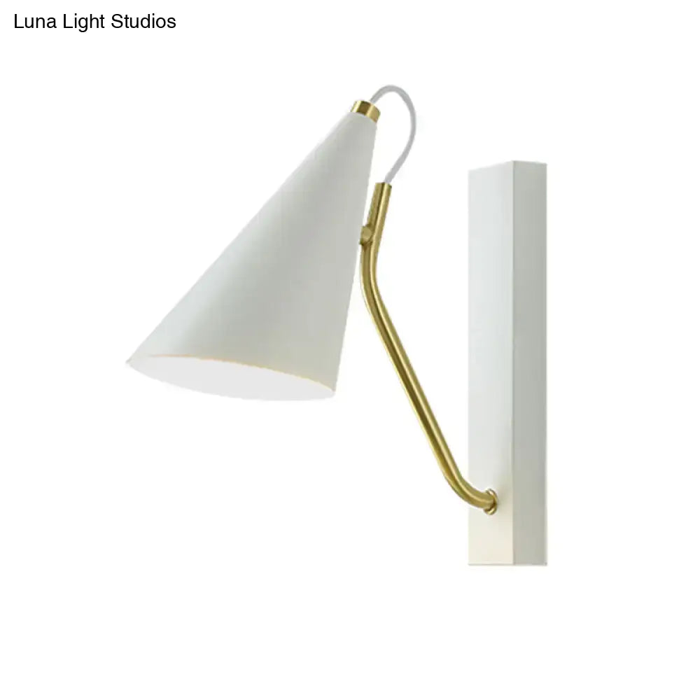 Black cone wall sconce with brass curved arm and white shade by Decorbites on Tampa Home & Garden Store
