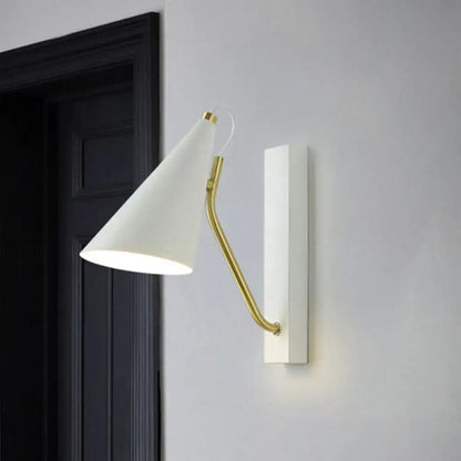 Decorbites Black Cone Wall Sconce with white shade and brass arm on white wall plate on Tampa Home & Garden Store