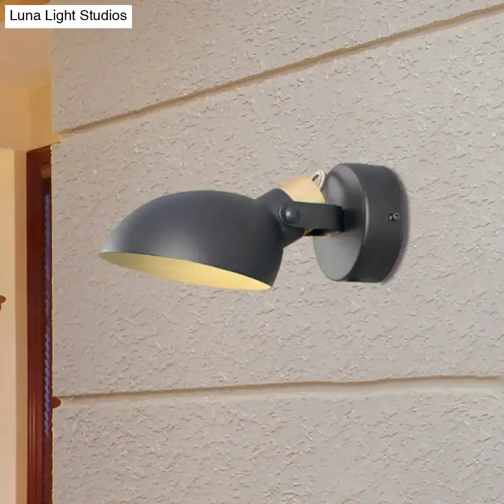 Modern black and cream adjustable wall sconce light with matte metal finish for bedroom decor on Tampa Home & Garden Store