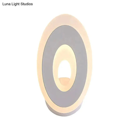 Modern black & cream oval LED wall lamp for bedroom by Decorbites on Tampa Home & Garden Store