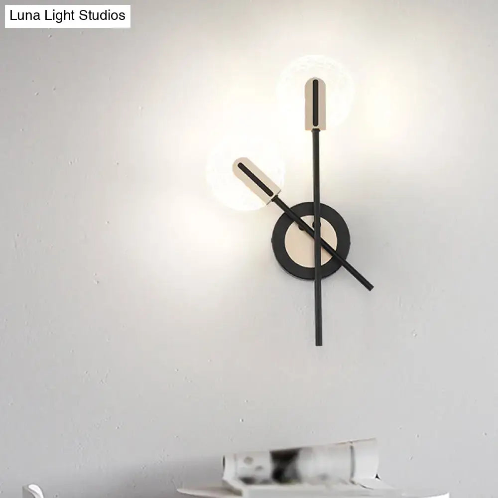 Black cast iron wall sconce with circular backplate and dual glass tube lights Decorbites on Tampa Home & Garden Store