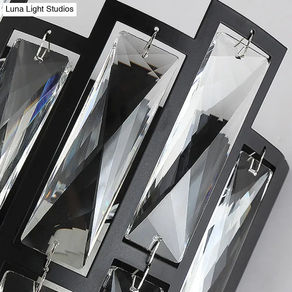 Black crystal half-cylinder block sconce by Decorbites with faceted prisms on a black frame on Tampa Home & Garden Store