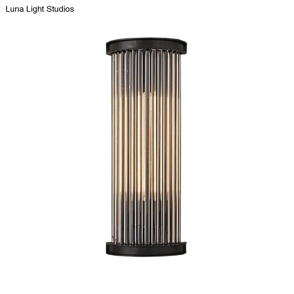Black crystal rod wall lamp with vertical glass rods and black caps on Tampa Home & Garden Store