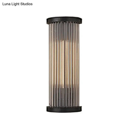 Black crystal rod wall lamp with vertical glass rods and black caps on Tampa Home & Garden Store
