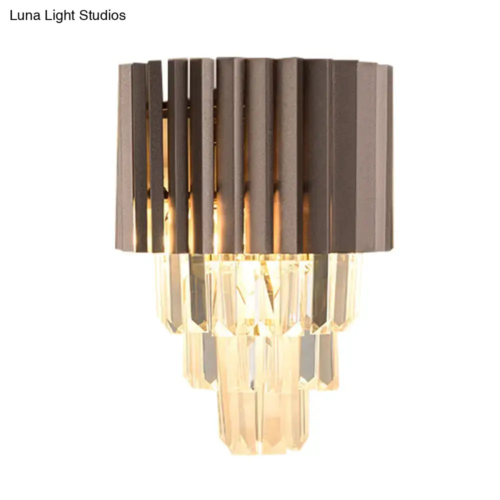 Black tiered crystal sconce by Decorbites with hanging prisms on Tampa Home & Garden Store