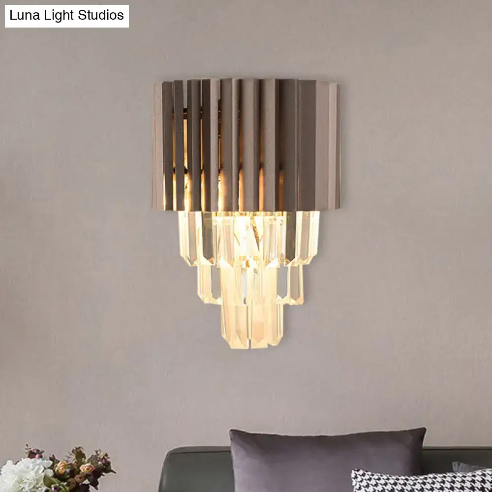 Black tiered crystal sconce with hanging glass prisms on Tampa Home & Garden Store