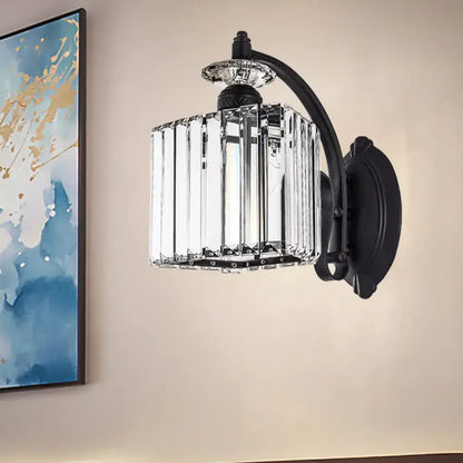 Black curved crystal sconce with ribbed crystal shade by Decorbites on Tampa Home & Garden Store