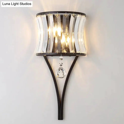 Modern black crystal wall sconce by Decorbites with curved panels and hanging prism, wall mount on Tampa Home & Garden Store