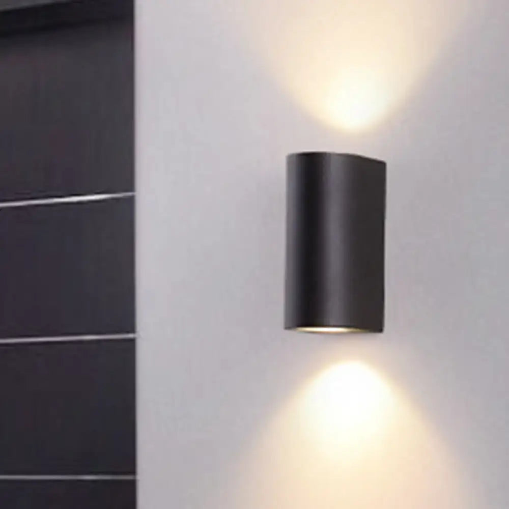 Black Cube LED Sconce by Decorbites; black metal wall light with upward and downward warm glow on Tampa Home & Garden Store