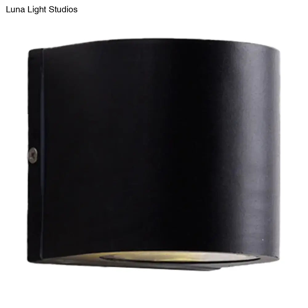Black Cube LED Sconce by Decorbites, black metal wall-mount fixture with downward glow on Tampa Home & Garden Store
