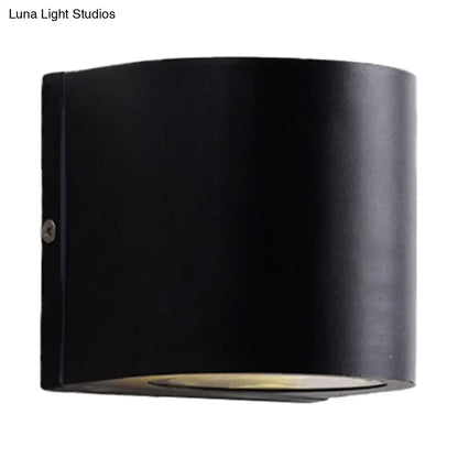 Black Cube LED Sconce by Decorbites, black metal wall-mount fixture with downward glow on Tampa Home & Garden Store
