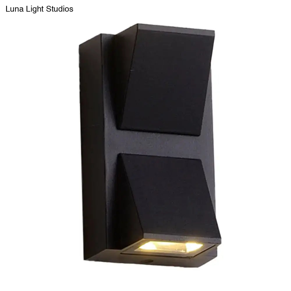 Black Cube LED Sconce by Decorbites, modern black metal wall light with warm LED glow on Tampa Home & Garden Store