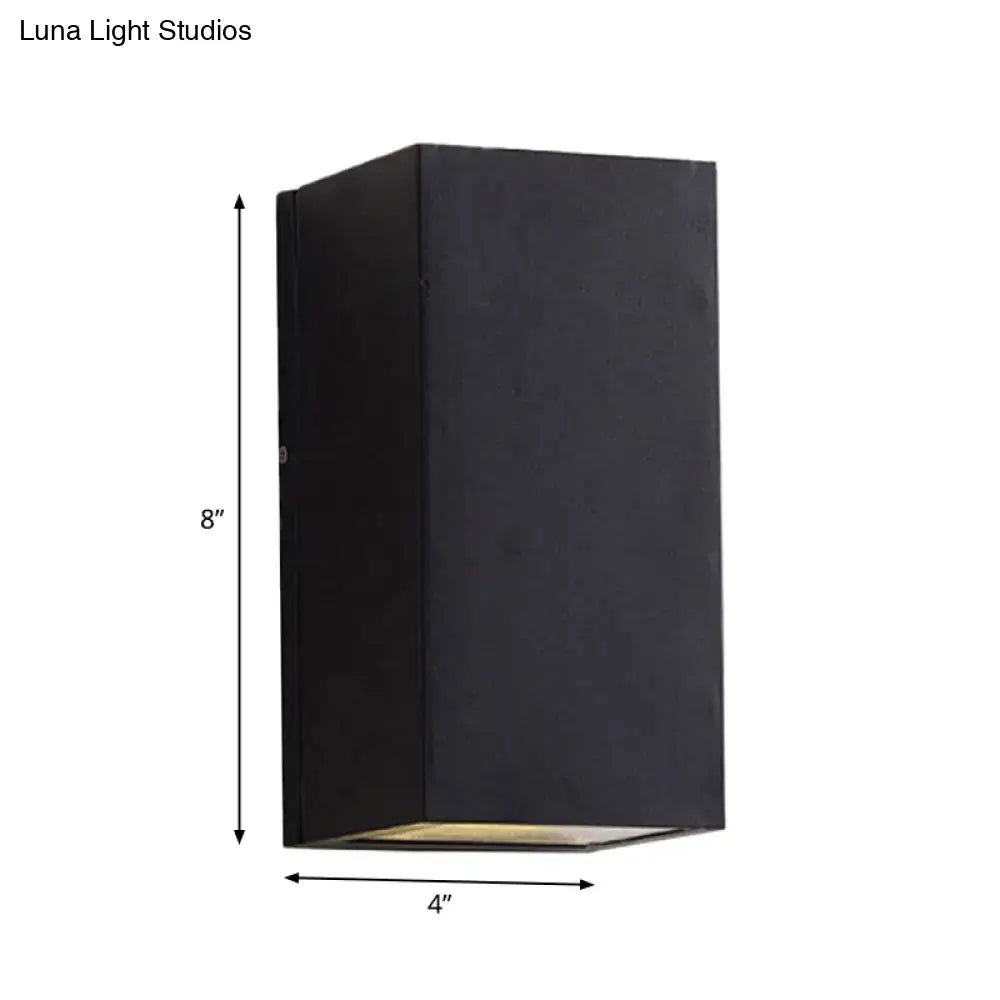 Black Cube LED Sconce, black metal wall light, 8in tall by 4in wide with warm LED glow on Tampa Home & Garden Store