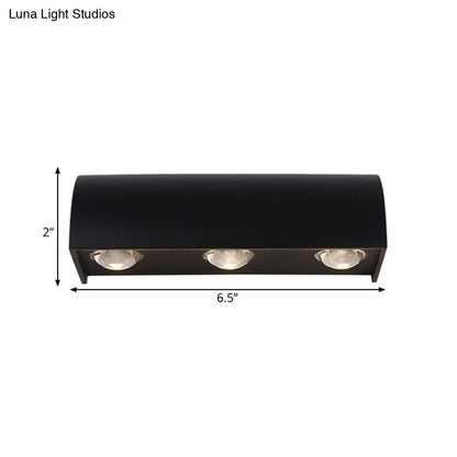 Black curved outdoor lamp with three bulbs by Decorbites on Tampa Home & Garden Store