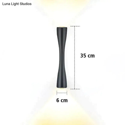 Decorbites black curved IP65 outdoor wall sconce, metal design, 35 cm tall x 6 cm wide on Tampa Home & Garden Store