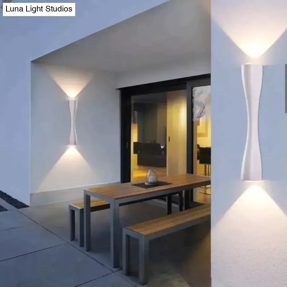 Two black curved IP65 outdoor wall sconces by Decorbites; upward/downward light on Tampa Home & Garden Store