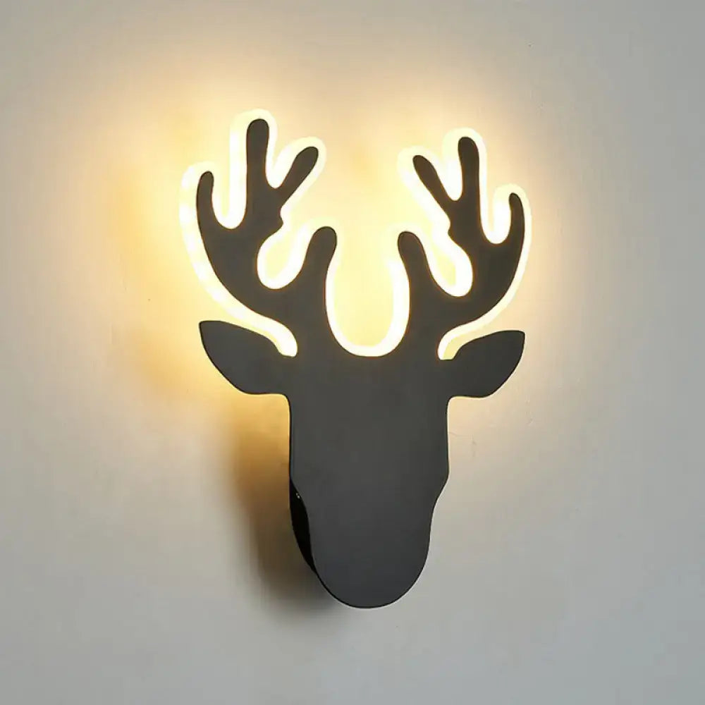 Black deer head wall sconce with LED glowing antlers Decorbites on Tampa Home & Garden Store
