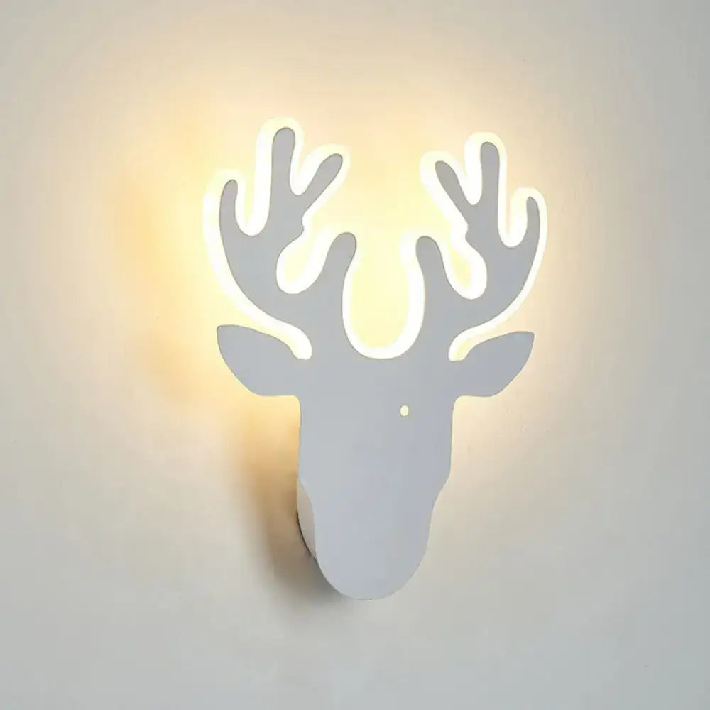 Black Deer Wall Sconce featuring an antler silhouette with warm backlit glow on Tampa Home & Garden Store