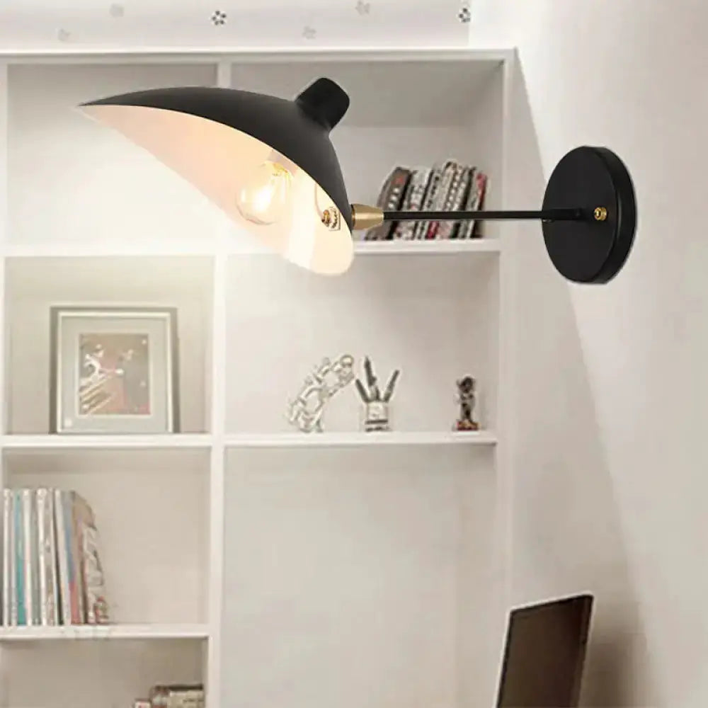 Modern black duckbill shade wall lamp by Decorbites with curved arm and brass accent on Tampa Home & Garden Store