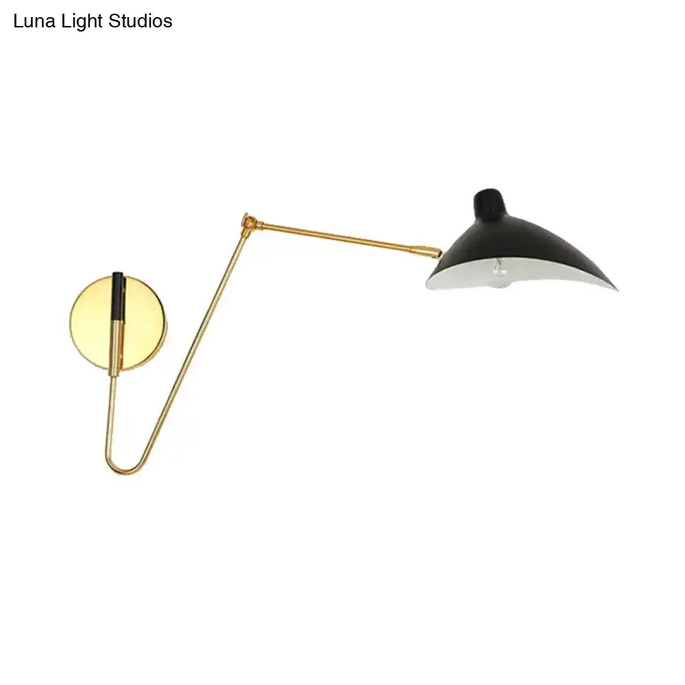 Modern black duckbill shade wall lamp with curved brass arm and round wall mount by Decorbites on Tampa Home & Garden Store