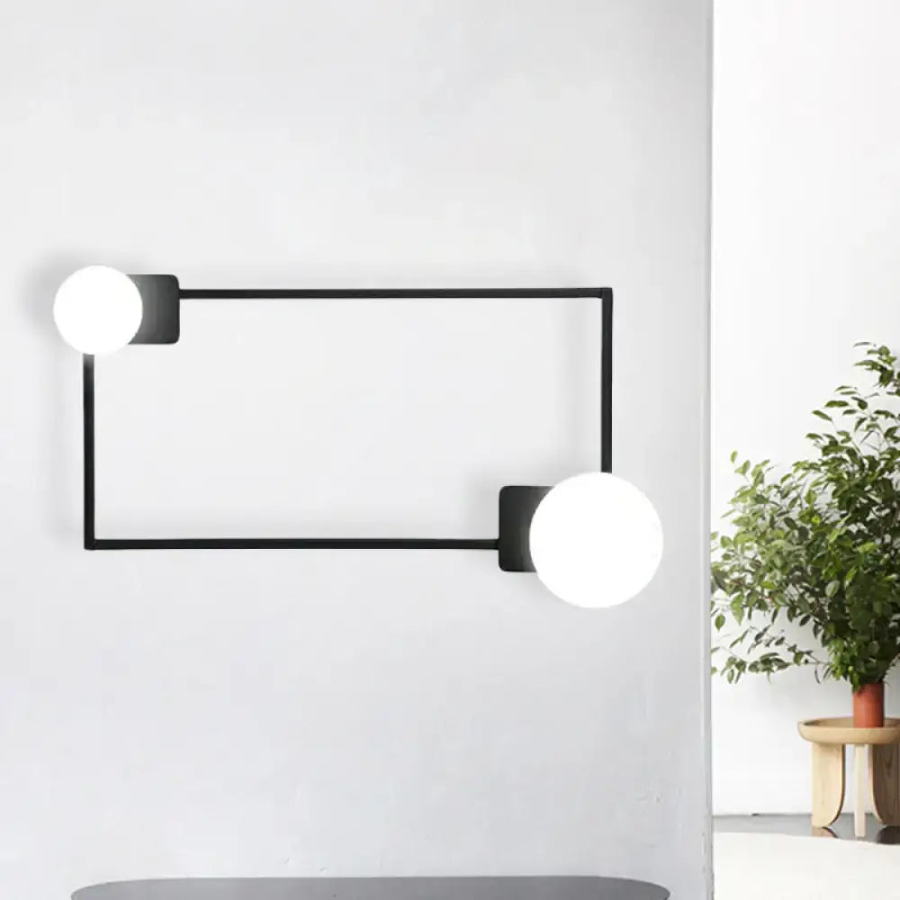Black Rectangle Glass Globe Sconce by Decorbites with two white globes on black metal frame on Tampa Home & Garden Store