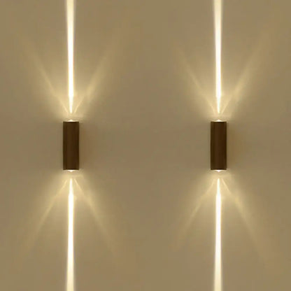 Decorbites black dual-beam wall sconces, pair with dark mounts and warm vertical beams on Tampa Home & Garden Store