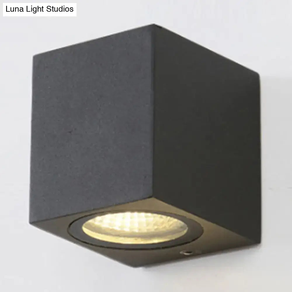 Black outdoor patio two-light wall sconce with cube metal housing on Tampa Home & Garden Store