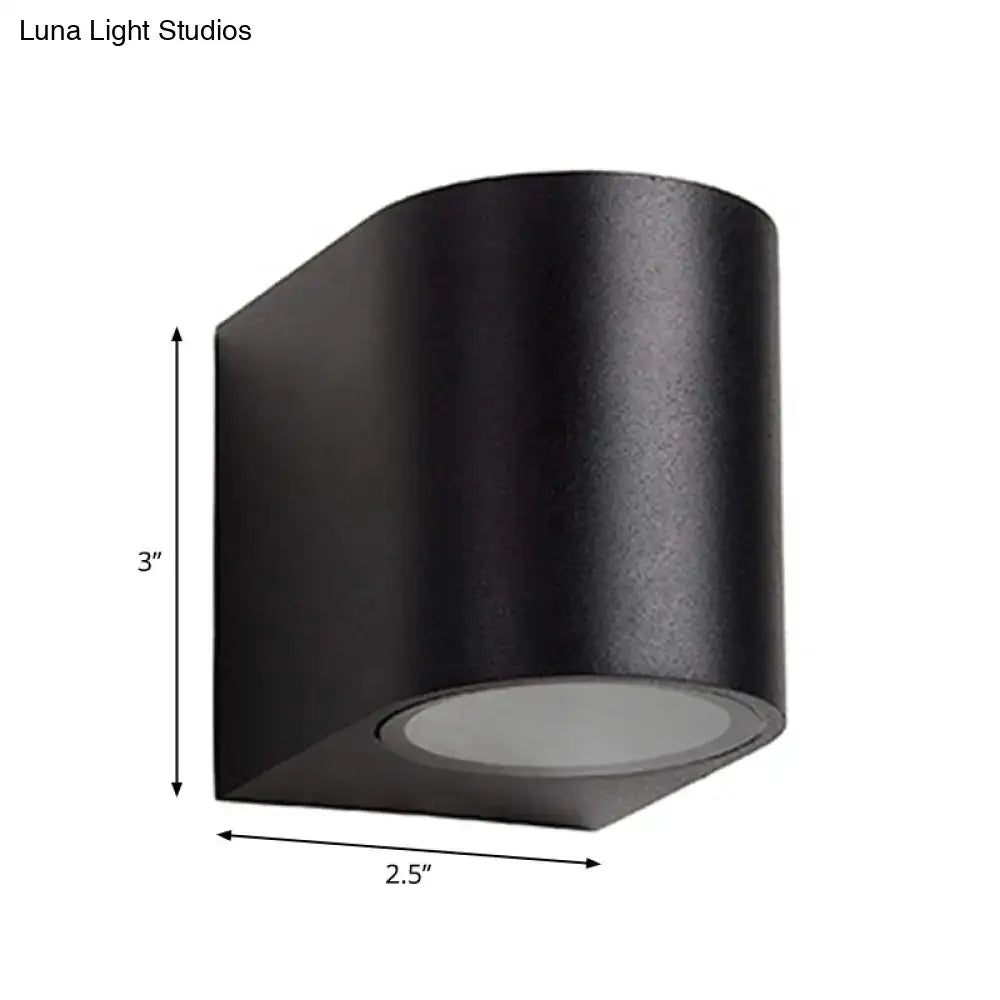 Black outdoor patio two-light wall sconce with cylindrical shade, 3in tall by 2.5in wide on Tampa Home & Garden Store